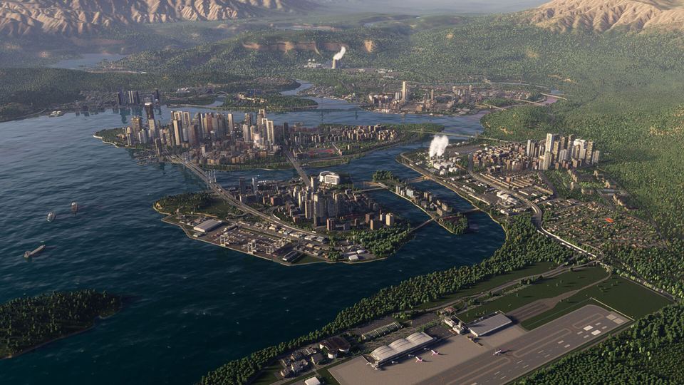 Cities: Skylines II のゲーム画面。湾に面した大きな街を上空から見たところ