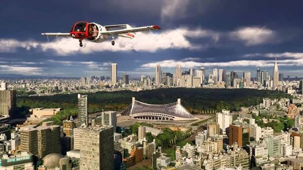 東京の街並みとスタジアムの上を飛ぶ小型機